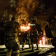 Pictured: People holding guns and a fire. Basicially, Resident Evil 6 in a nutshell.